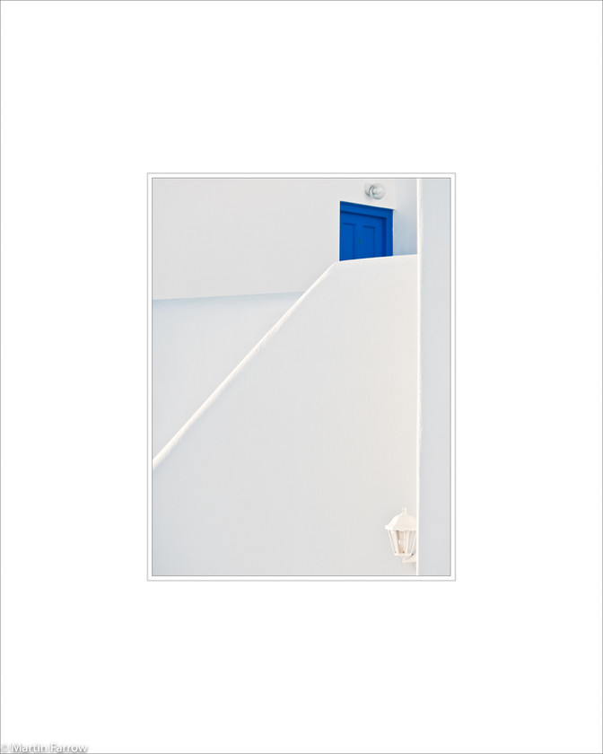 02 Blue-Door 
 Blue door in white walls 
 Keywords: ARPS panel fine art blue white simple abstract graphic architecture door angle diagonal wall Santorini Greece island