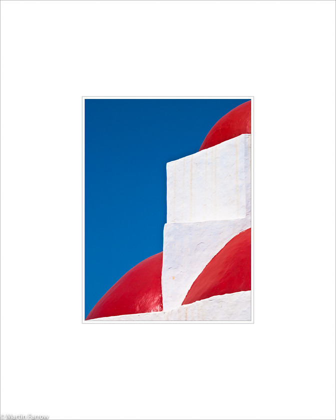 14 Red-Domes 
 White wall with red domes against blue sky 
 Keywords: ARPS panel fine art blue white simple abstract graphic architecture red wall dome church shapes Mykonos island Greece