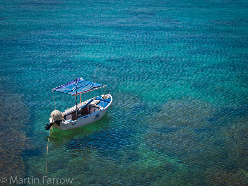 Irima 
 Boat moored on Greek shore 
 Keywords: Greece, Mykonos, absreact, clear,boat,moored,shore,sea,ocean,calm,blue,clear