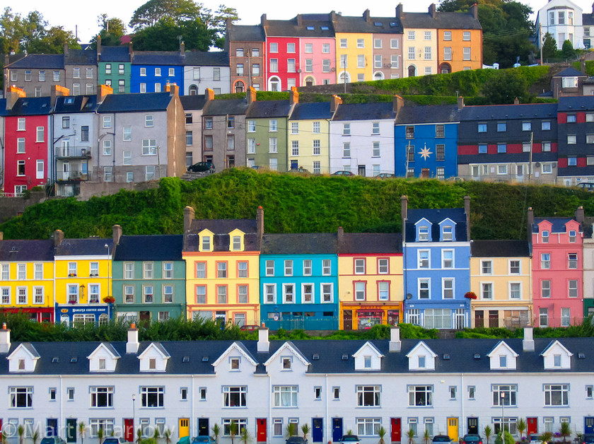 Coloured-Houses 
 Brightly coloured houses on hillside 
 Keywords: houses,colours,hill,rows