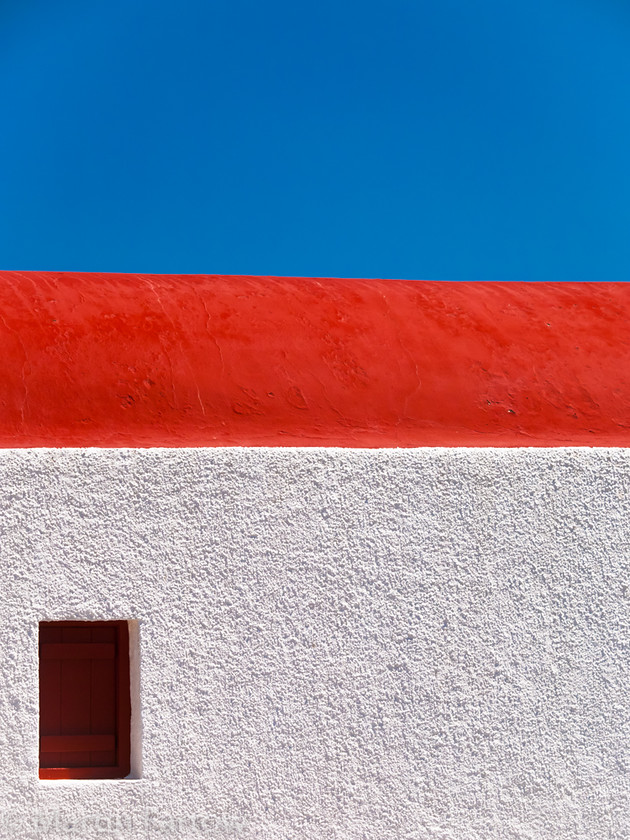 Tri-Colour 
 Greek church against blue sky 
 Keywords: Greece, Korfos Bay, Mykonos,church,red roof,blue sky,white,wall,window