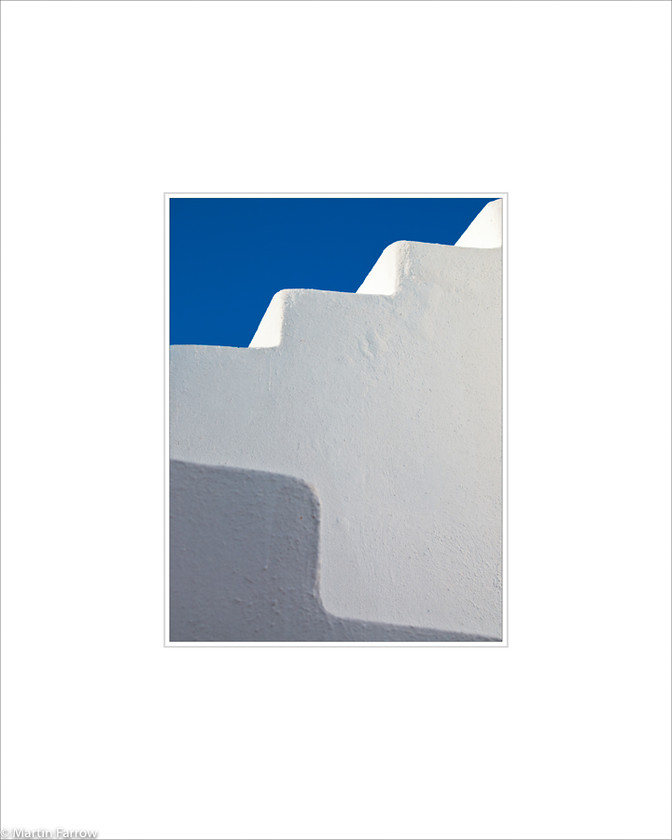 15 Stairway-to-Heaven 
 Stepped white wall against blue sky 
 Keywords: ARPS panel fine art blue white simple abstract graphic architecture sep stair wall church climb sky Santorini Greece island