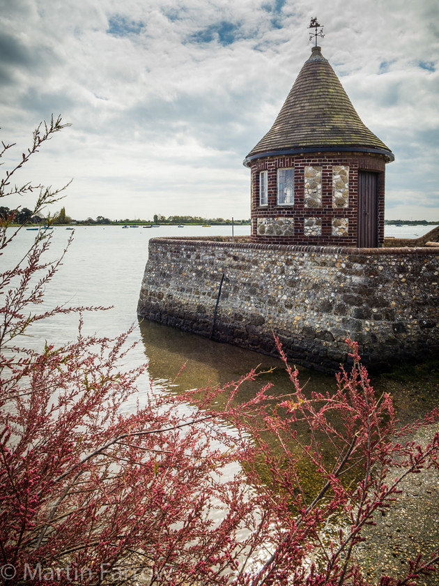 Lookout 
 Round building on water front 
 Keywords: Bosham, House, West Sussex, beach, coast, creek, nbuilding, point, round, sea, shore, spring, tower, wall, water