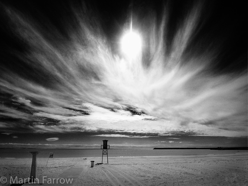 Ghost-Clouds-mono 
 Ghostly-like clouds over beach 
 Keywords: beach, clouds, sky,sand,water,sea,ocean,sun,wide,presence