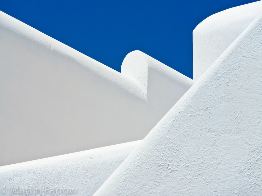 Walls 
 White walls and blue sky 
 Keywords: Greece, Mykonos,wall,white,blue,simple,tones,shapes