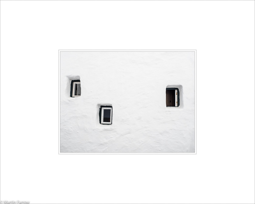 07 Three-Windows 
 Three small square windows in a white wall 
 Keywords: ARPS panel fine art white simple abstract graphic architecture wall window three square hole portal Santorini Greece island Menorca Spain