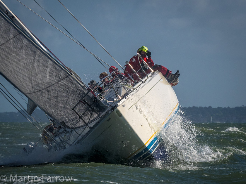 Bow-On 
 Yacht approaching bow-on while heeling to windward 
 Keywords: Battle of Britain, RAFYC, Solent, boats, bow, crew, front, head, heel, racing, rally, sails, sea, splash, spray, water, waves, yachts