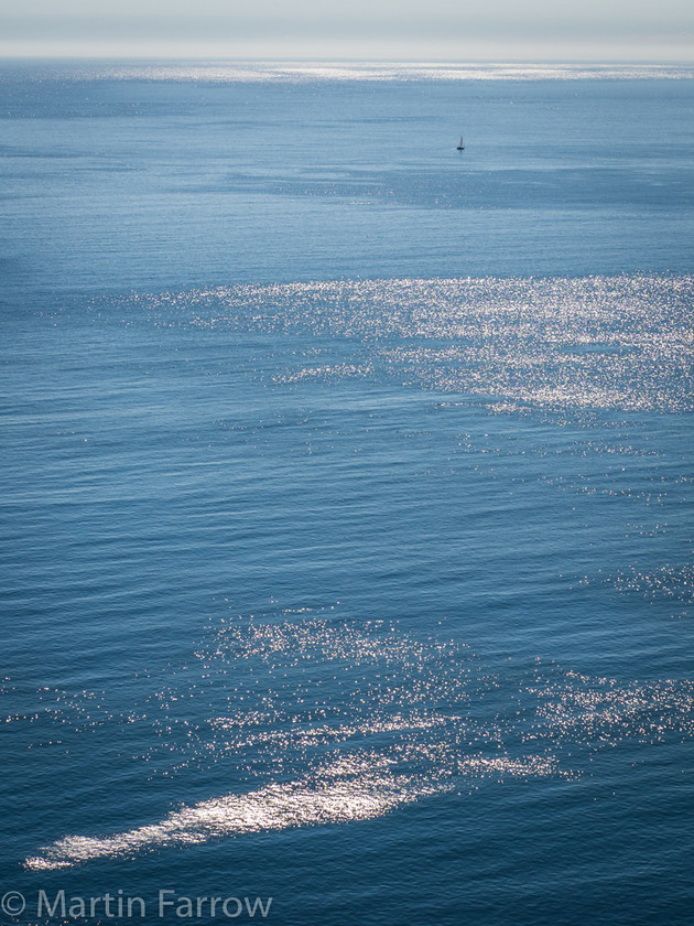 All-Alone 
 Lone yacht on calm blue sea with sun sparkling on the water 
 Keywords: Dorset, Portland, alone, blue, boat, calm, landscape, lone, ocean, sea, space, sparkle, summer, sun, sunlight, view, water, yacht